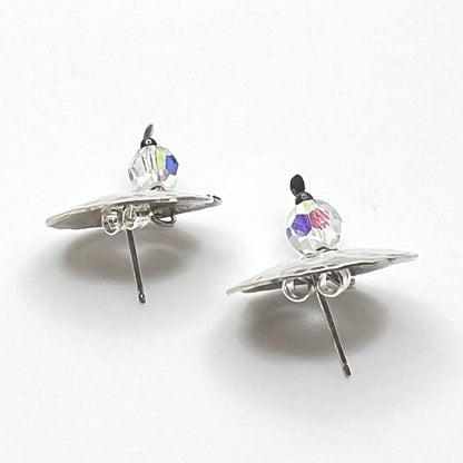 Side view Vintage hammered sterling silver spiral earrings with aurora borealis crystal dangles
