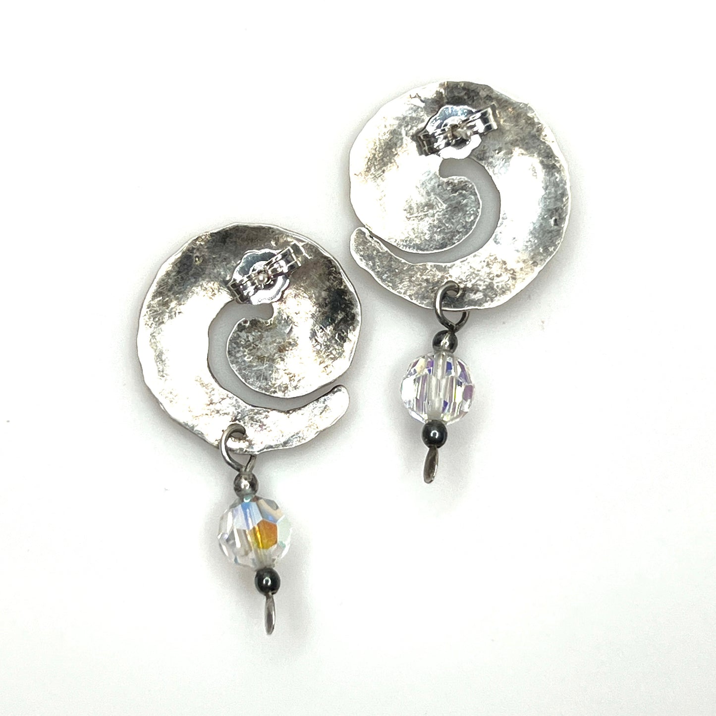 Back view of vintage sterling silver spiral earrings with crystal dangles