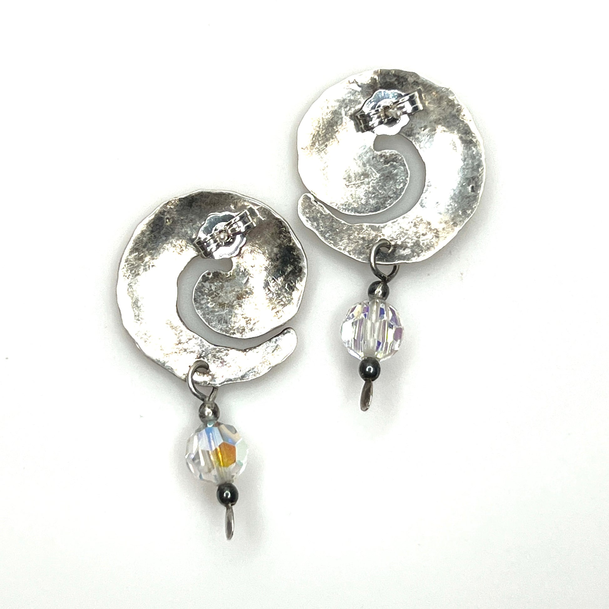 Back view of vintage sterling silver spiral earrings with crystal dangles