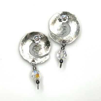 Back view of vintage sterling silver spiral earrings with crystal dangles