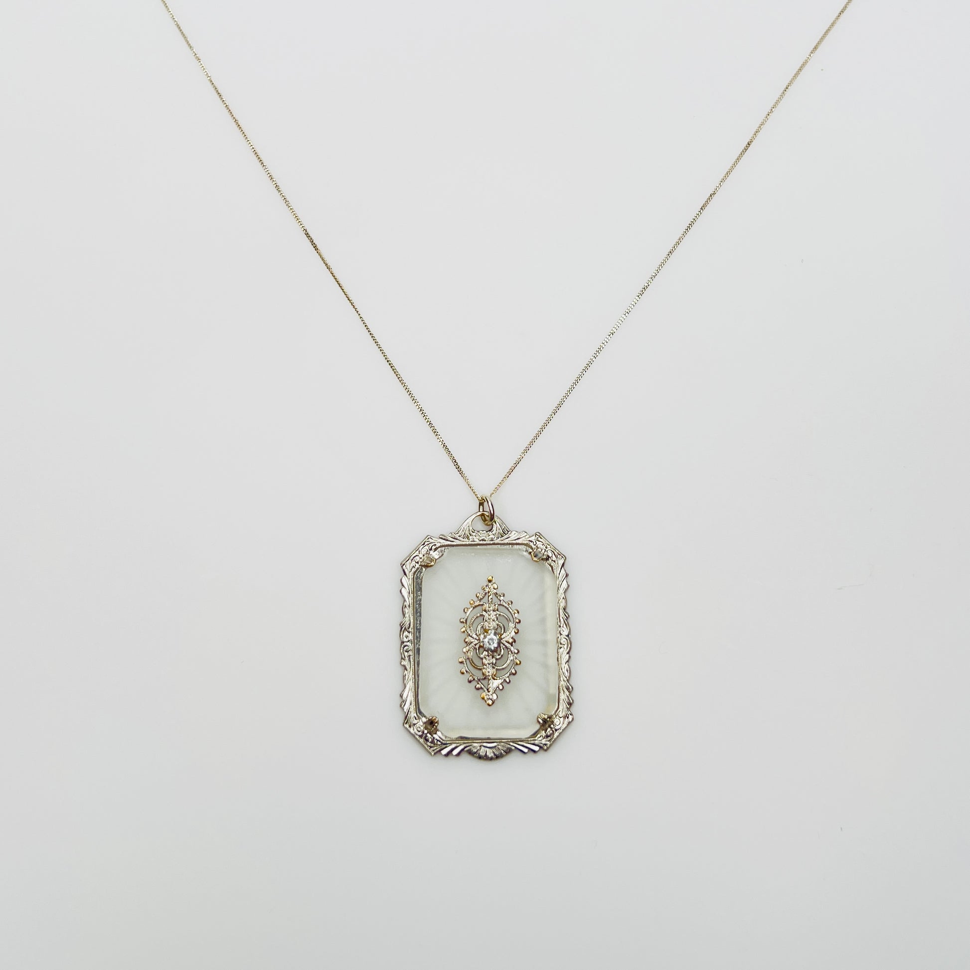 Sterling silver camphor glass pendant necklace with rhinestone center