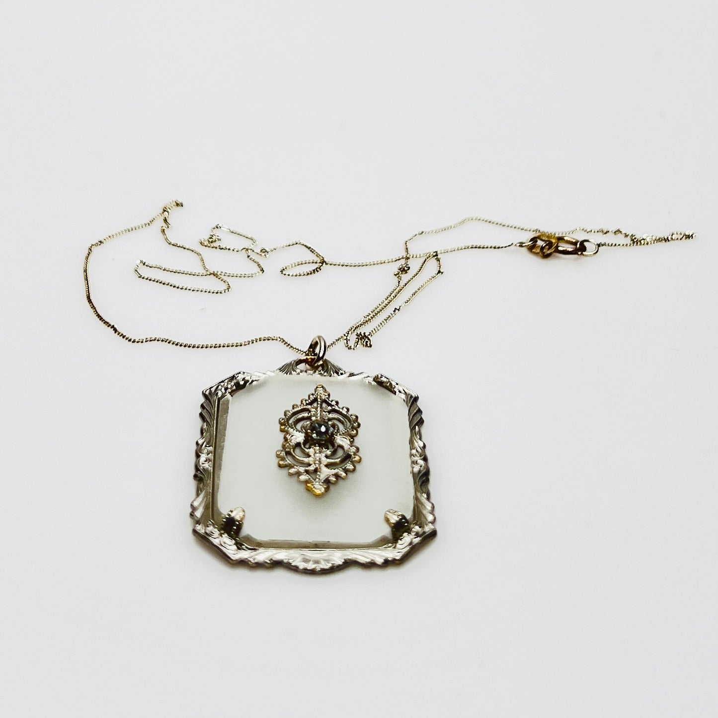 Sterling silver camphor glass pendant necklace with rhinestone center