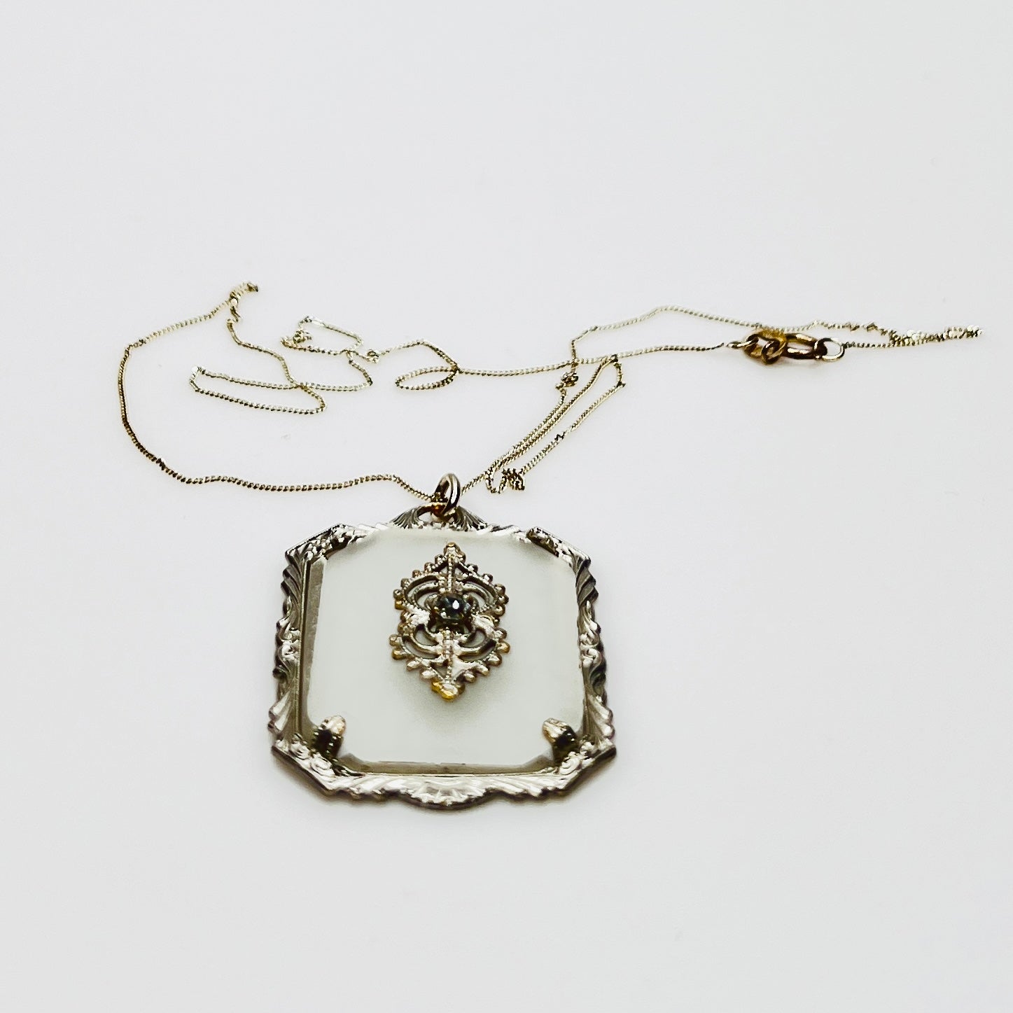 Sterling silver camphor glass pendant necklace with rhinestone center