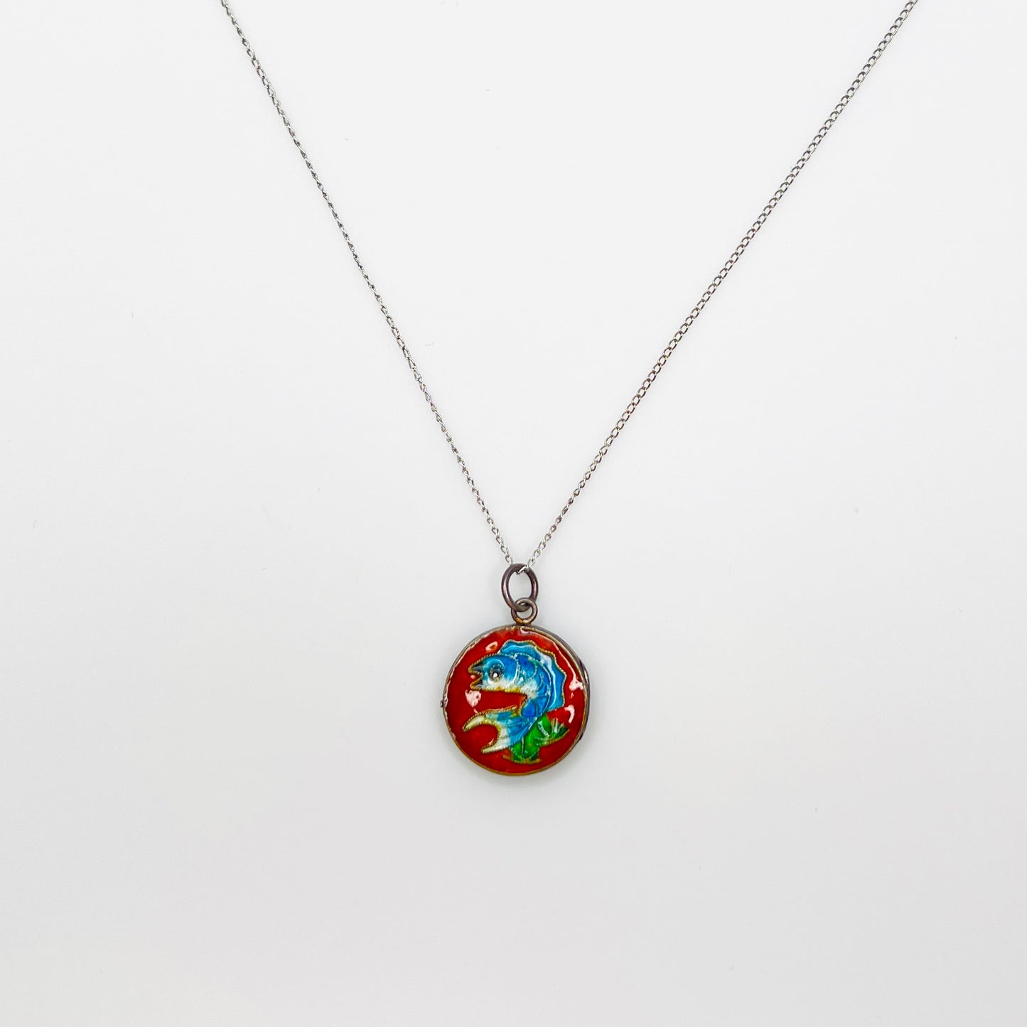 Vintage sterling silver cloisonné koi fish locket on 19-inch sterling chain.