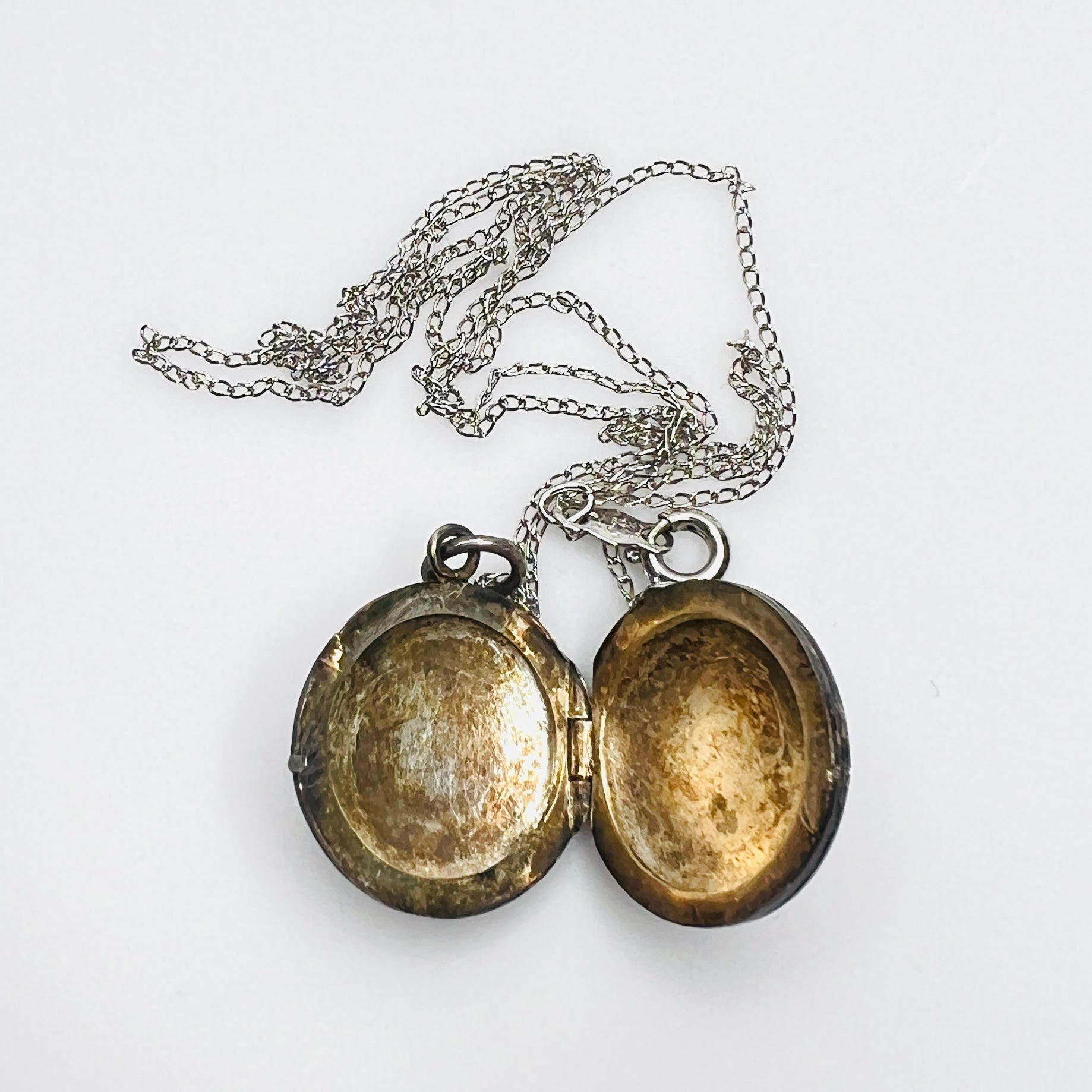 Open view of vintage sterling silver cloisonné koi fish enamel locket