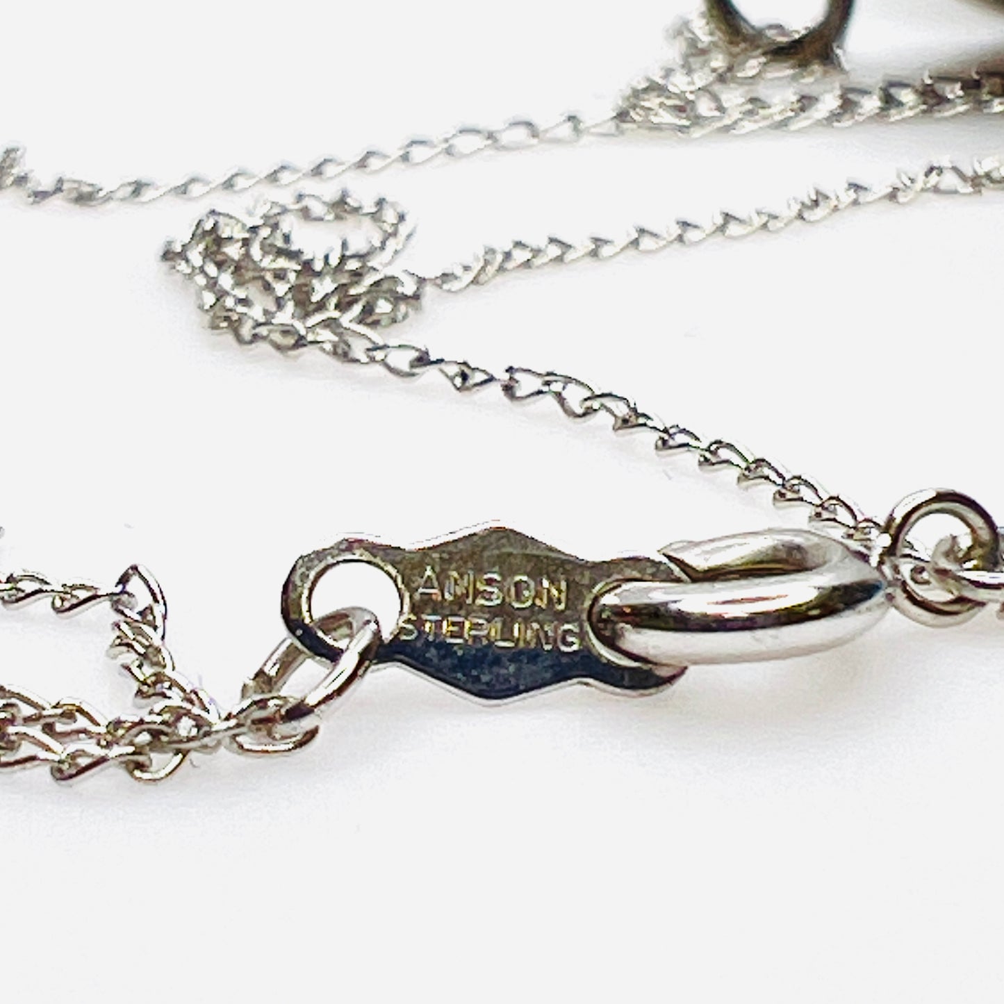 Anson Sterling marked spring ring clasp on vintage sterling silver chain.