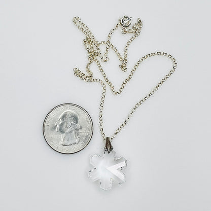 Vintage snowflake necklace with quarter for size reference