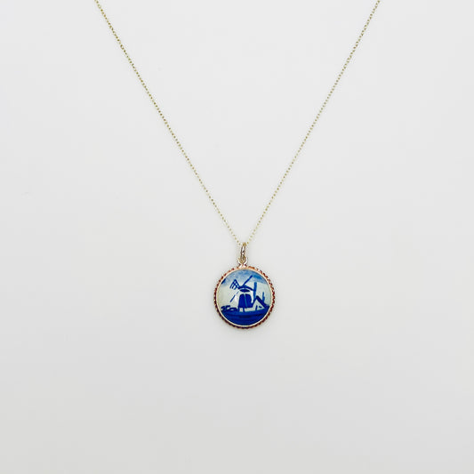 Vintage sterling silver Delft pendant necklace featuring blue Dutch windmill porcelain charm