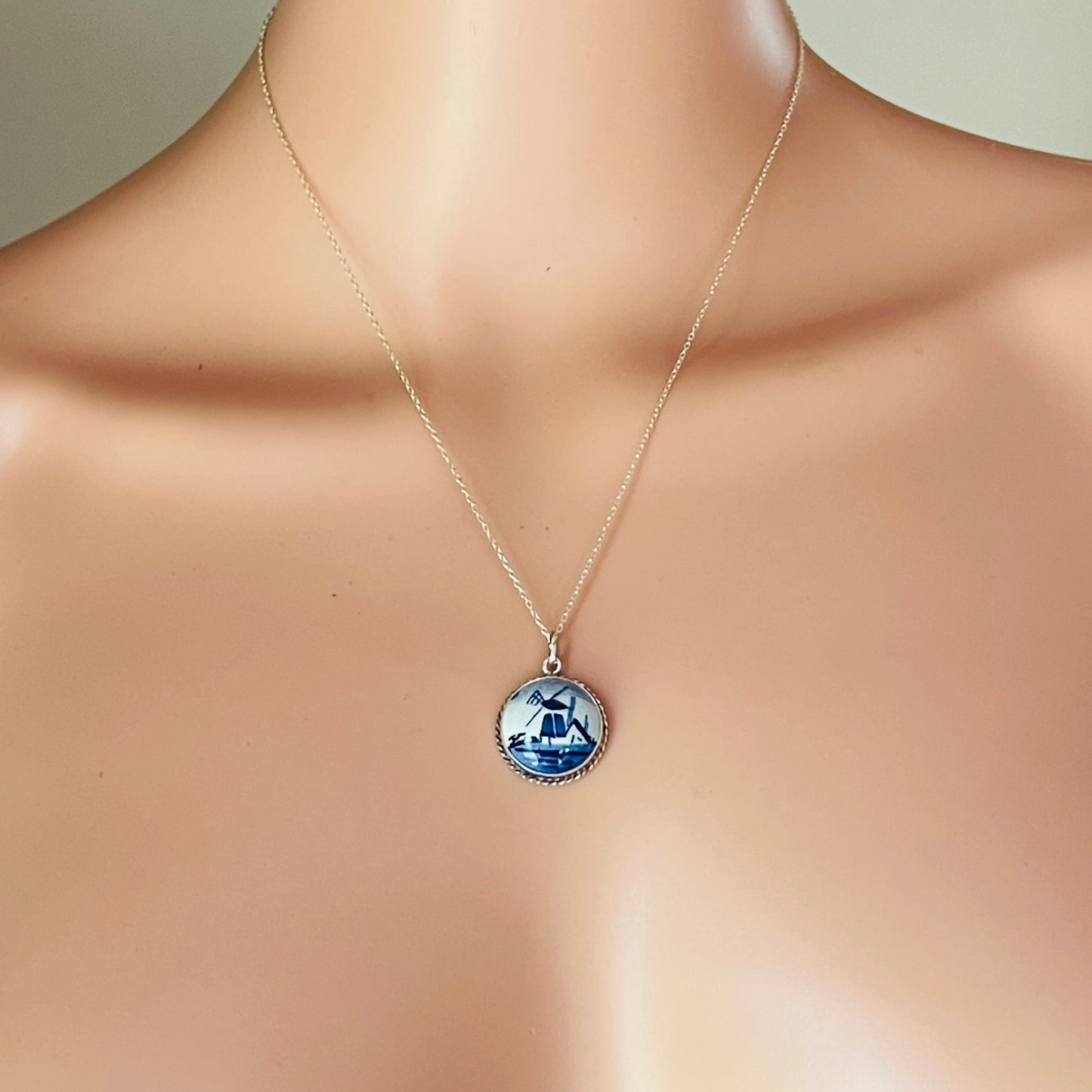 Vintage sterling silver Delft pendant necklace featuring blue Dutch windmill porcelain charm