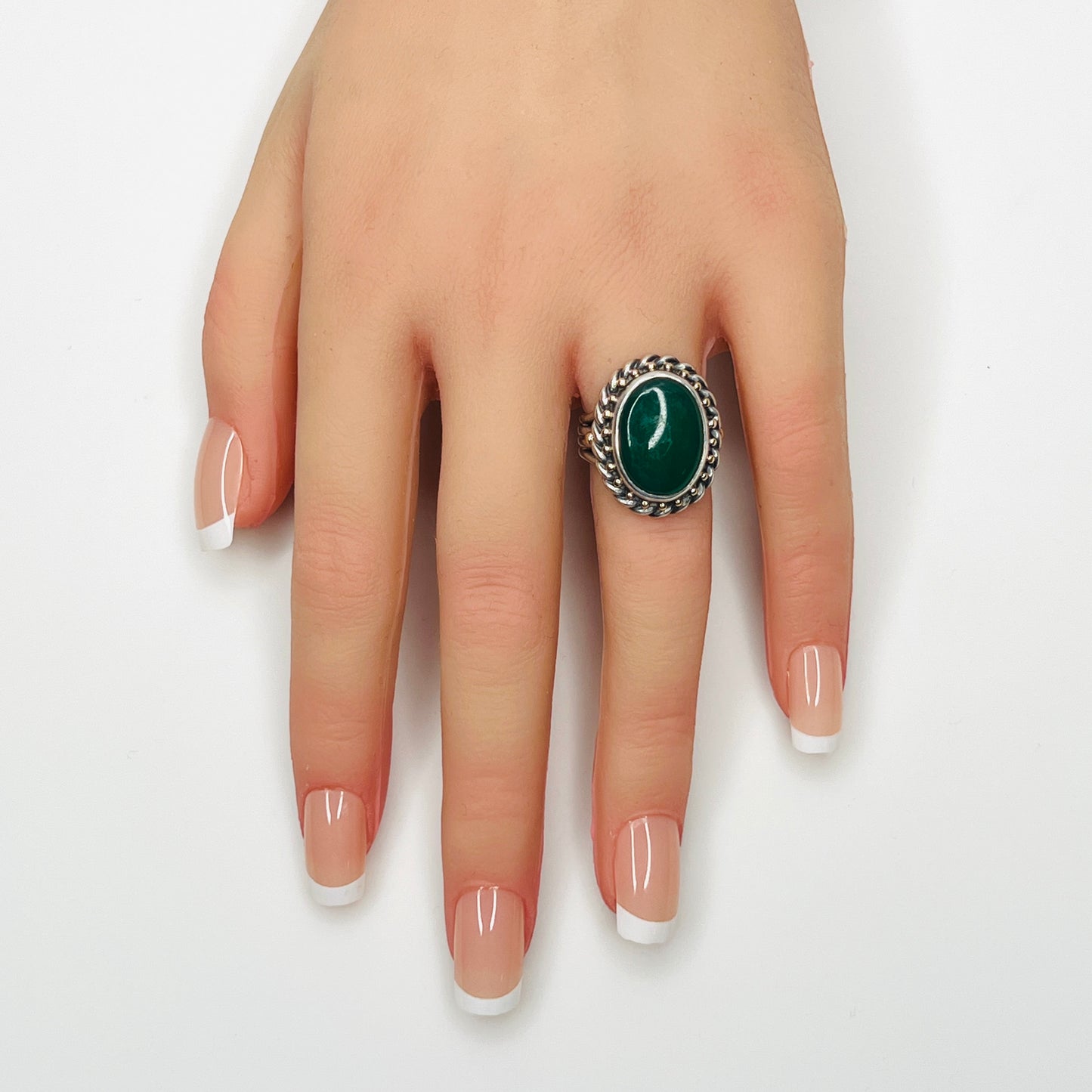 Vintage sterling silver green gemstone statement ring shown on hand model