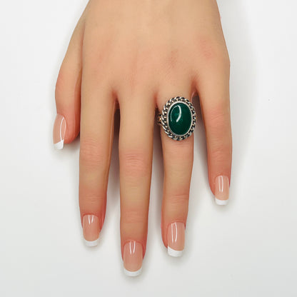 Vintage sterling silver green gemstone statement ring shown on hand model