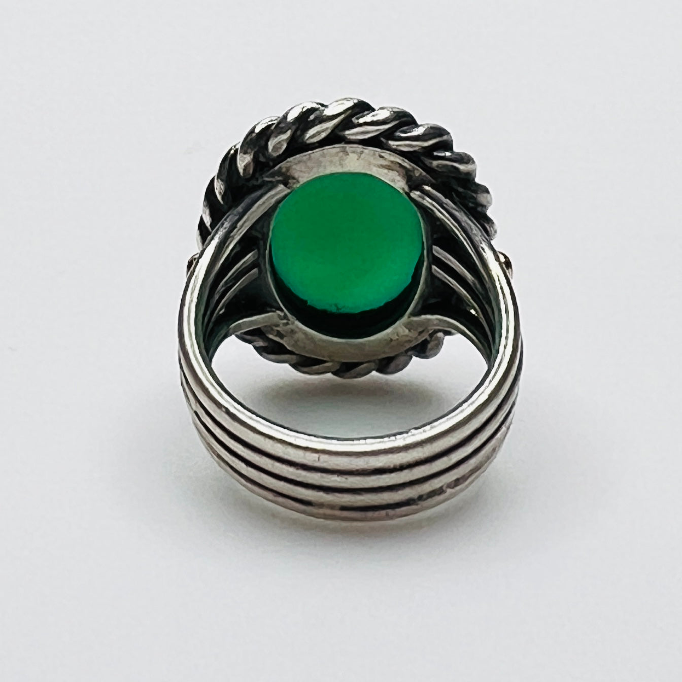 Underside view of vintage sterling silver green gemstone statement ring