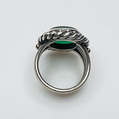 Side profile of vintage artisan sterling silver green gemstone ring