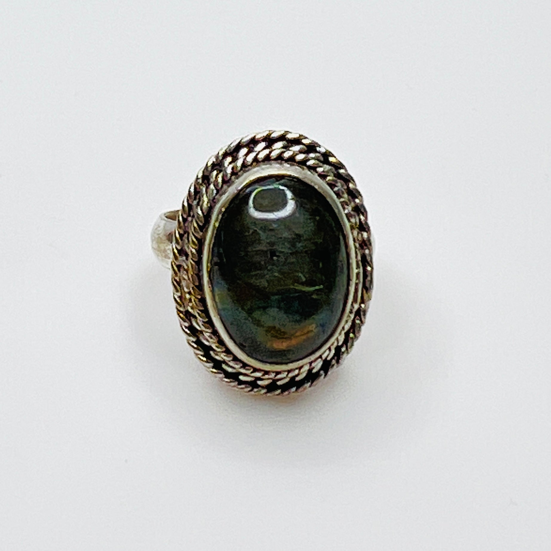 Vintage sterling silver artisan ring with oval labradorite cabochon and rope border