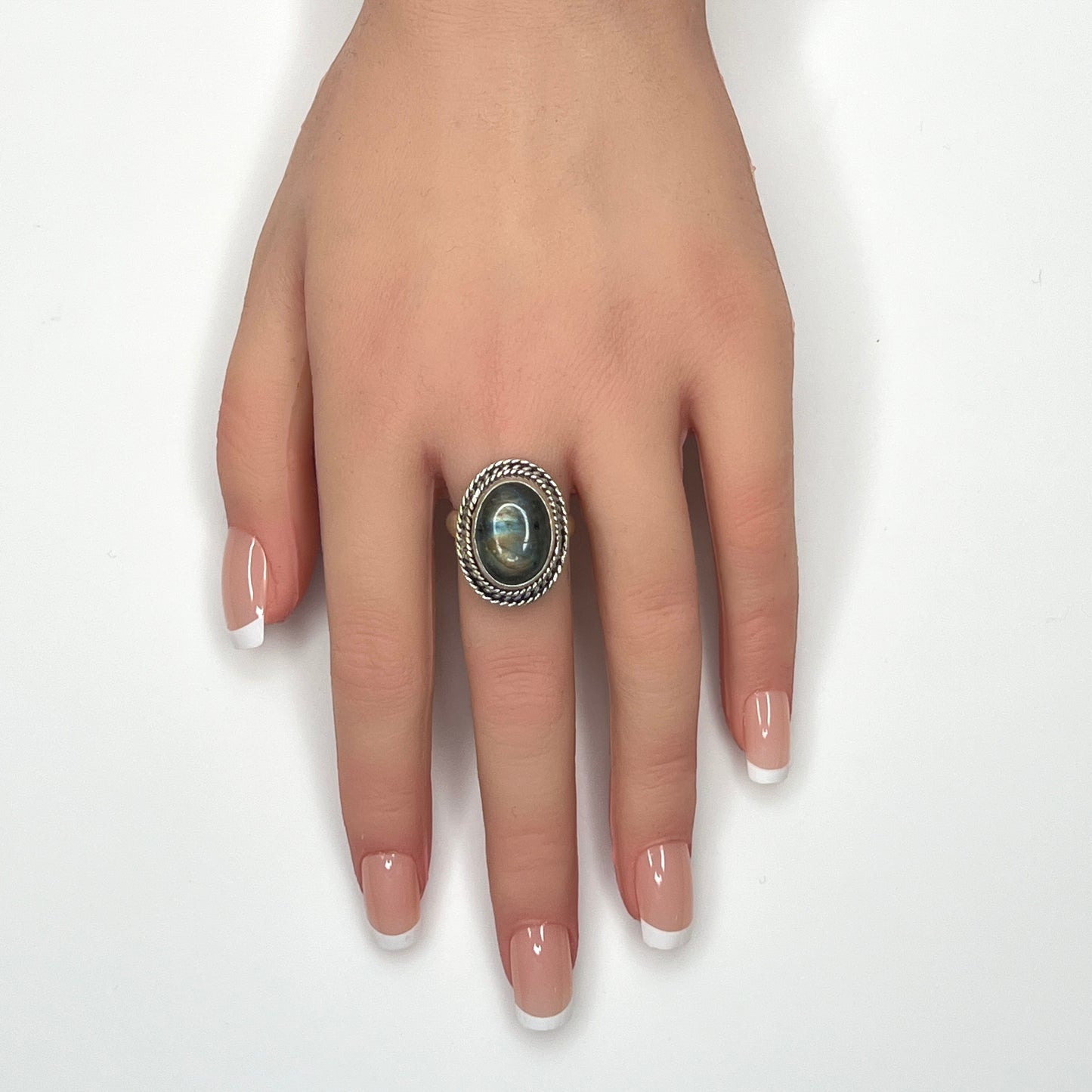 Vintage sterling silver labradorite statement ring shown worn on hand model