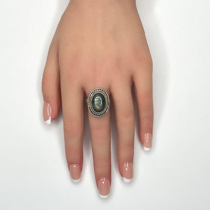 Vintage sterling silver labradorite statement ring shown worn on hand model