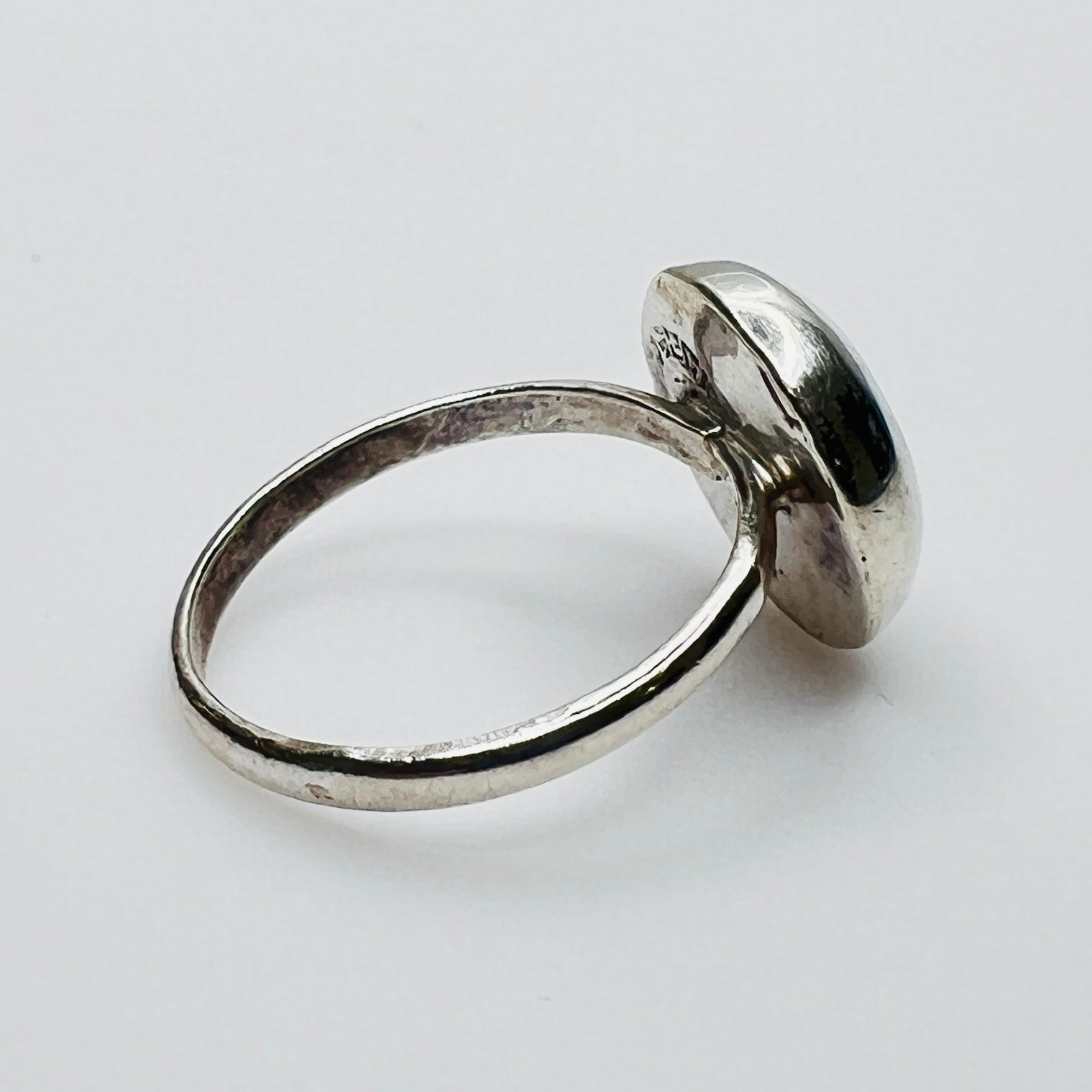 Side view of vintage sterling silver pearl shell ring