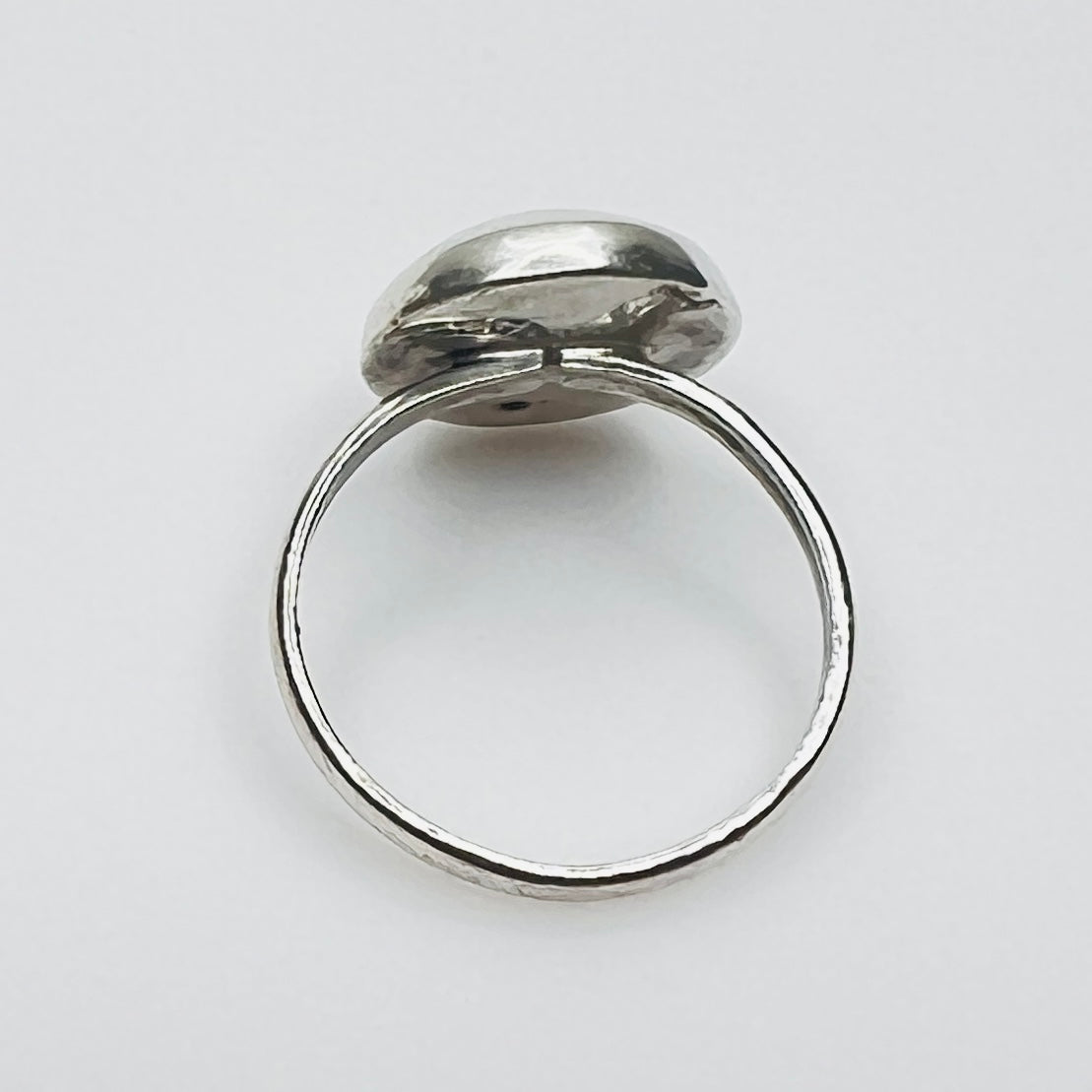 Side view of vintage sterling silver pearl shell ring