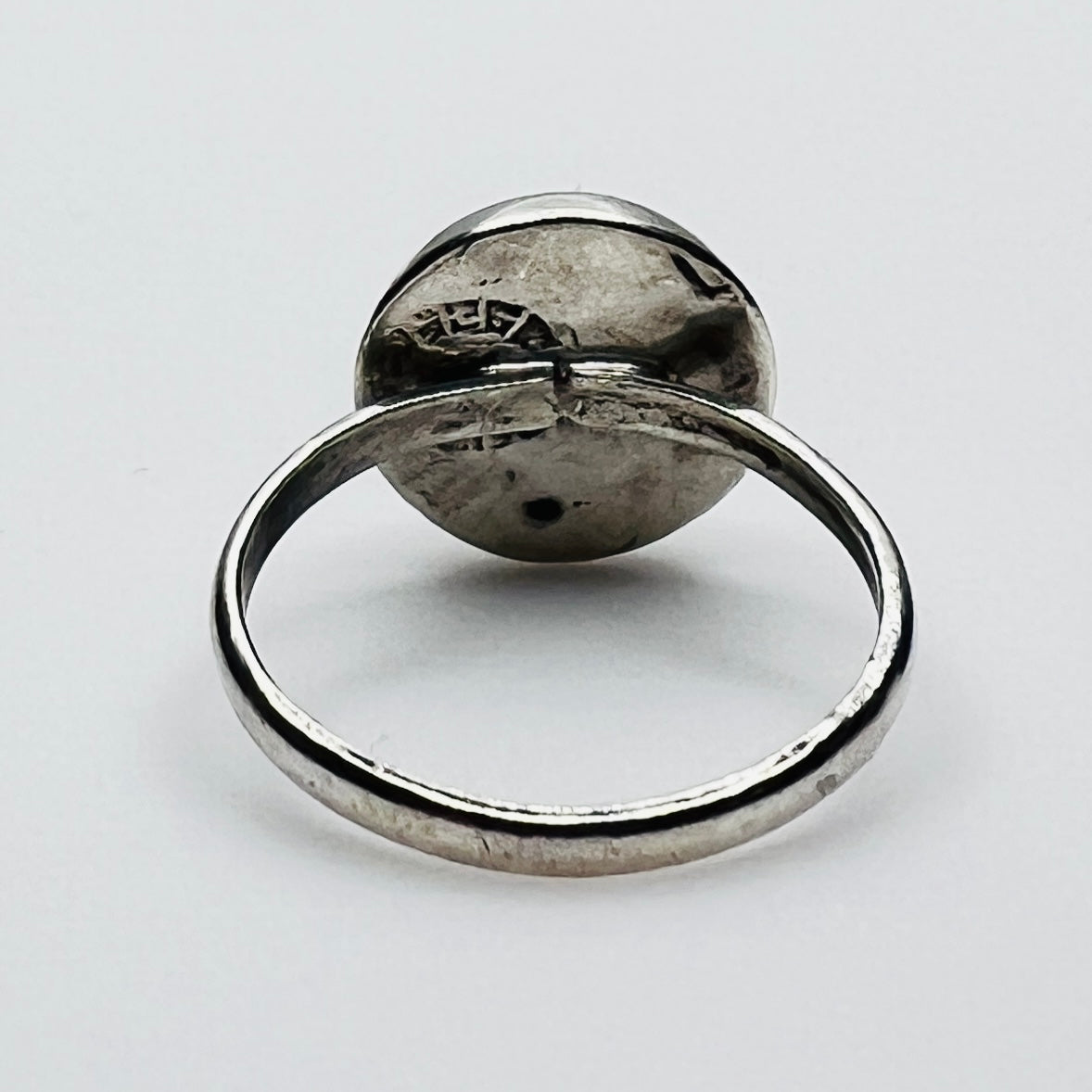 Back view of handcrafted sterling silver mother of pearl ring