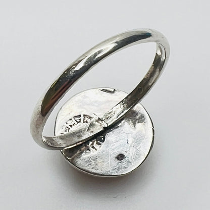 Back view of handcrafted sterling silver mother of pearl ring