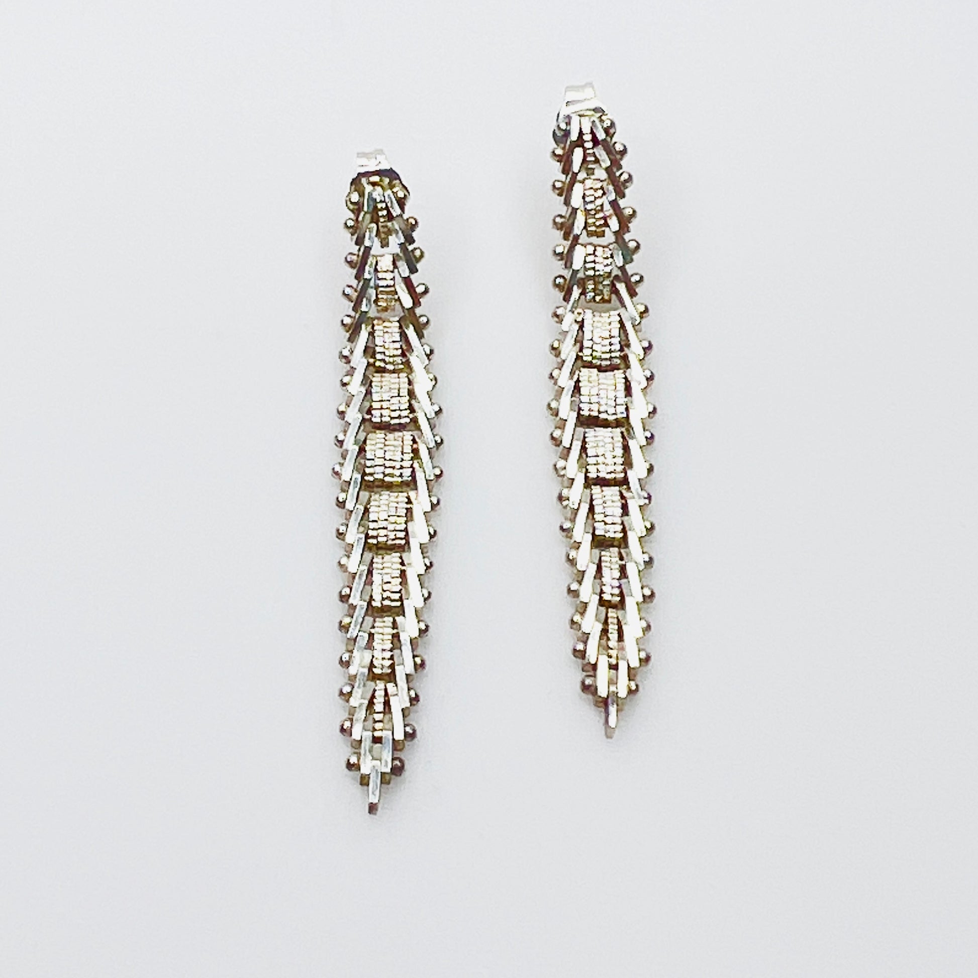 Vintage sterling silver geometric dangle earrings with textured modernist design
