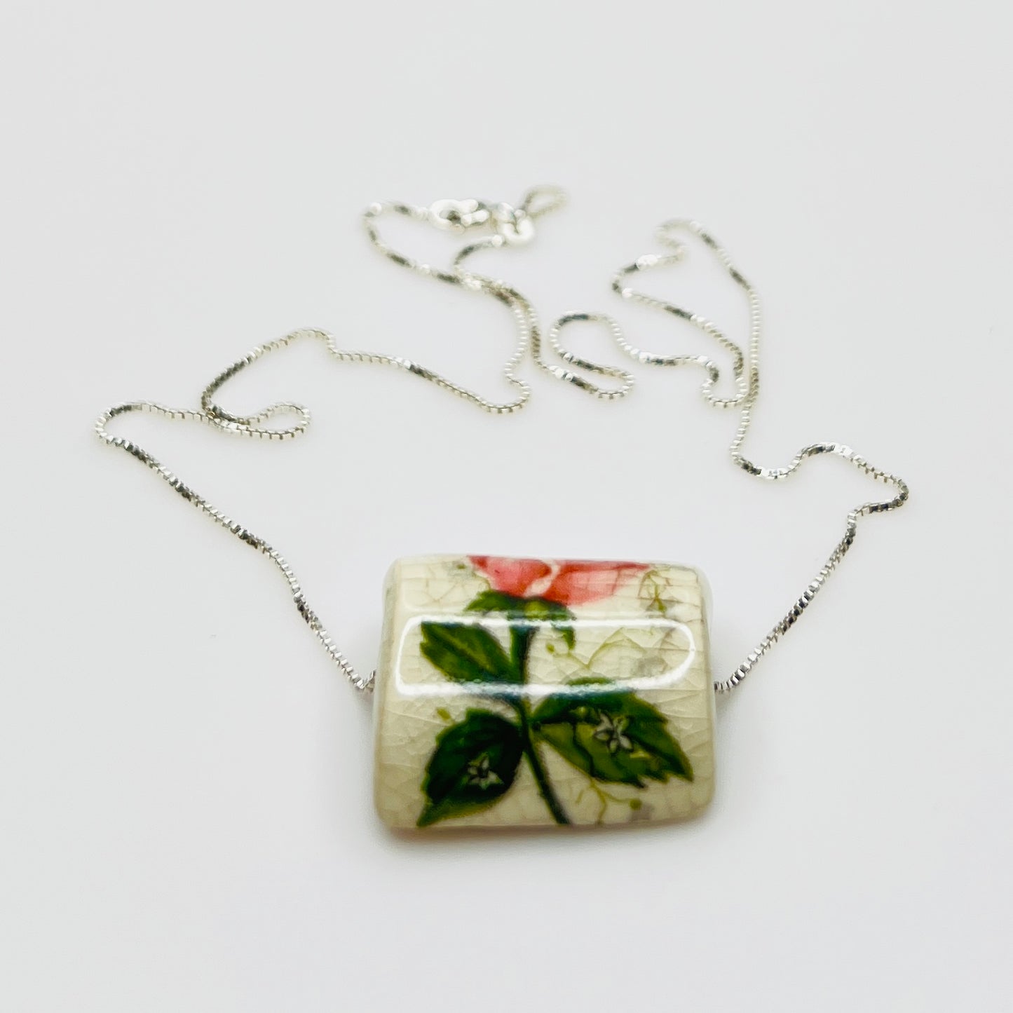 Sterling silver necklace with pink rose ceramic pendant