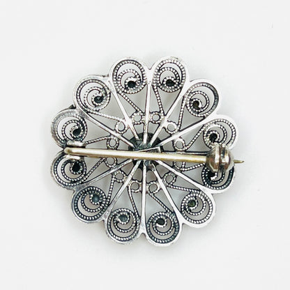 Reverse of sterling silver brooch with secure rollover clasp.