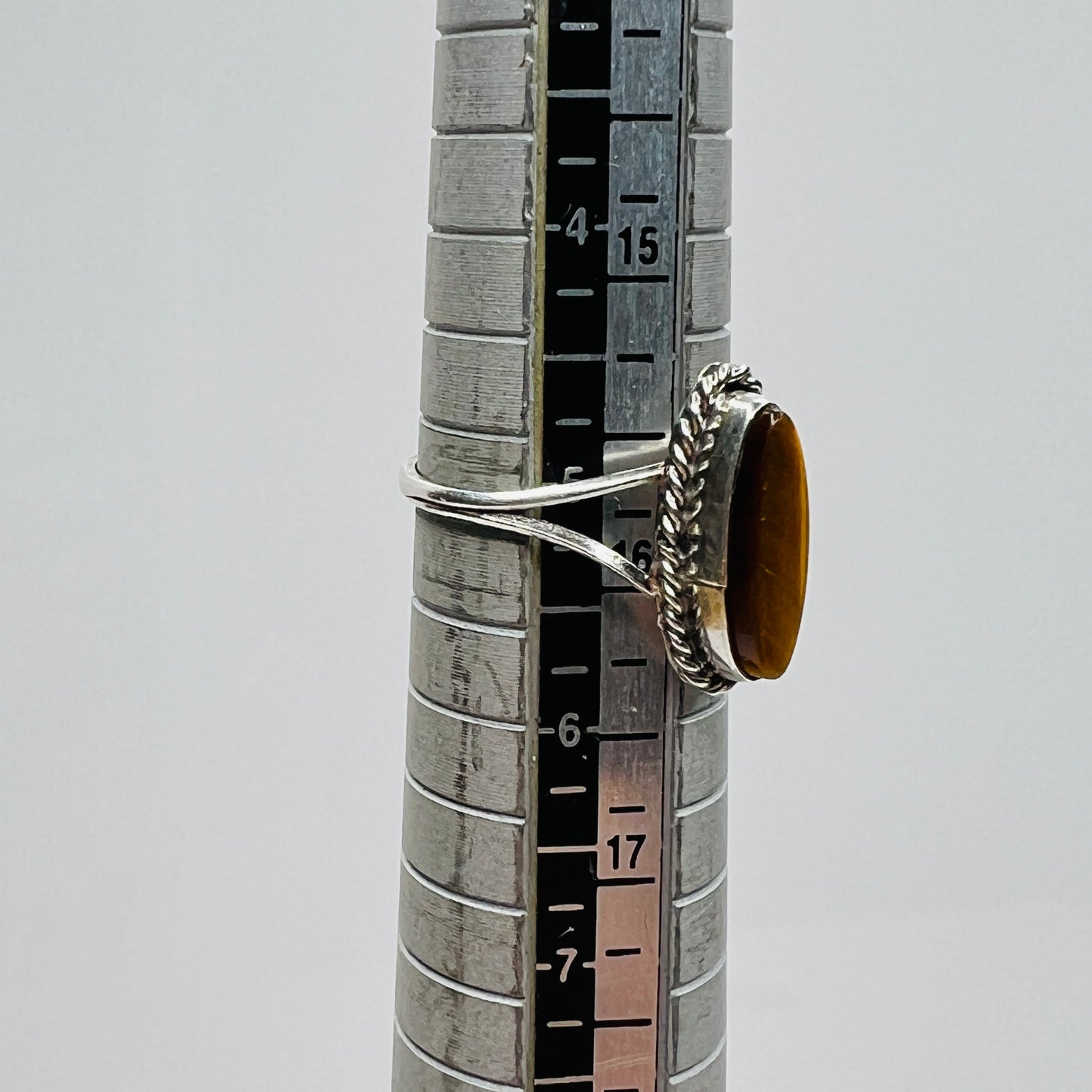 Ring on mandrel showing size and elongated face