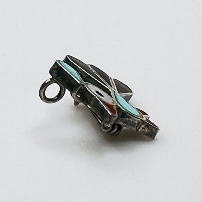 Side profile of vintage sterling silver bird brooch pendant showing inlay construction and pendant loop