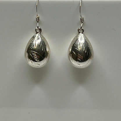 Sterling silver puff teardrop earrings with etched leaf design