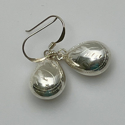 Sterling silver puff teardrop earrings with etched leaf design