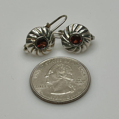 Sterling silver leverback earrings with red spinel cabochons in swirl design