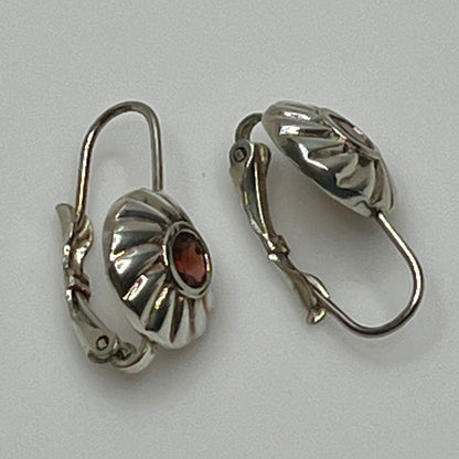 Sterling silver leverback earrings with red spinel cabochons in swirl design