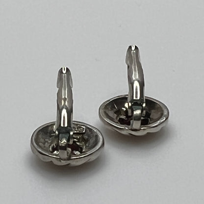 Sterling silver leverback earrings with red spinel cabochons in swirl design