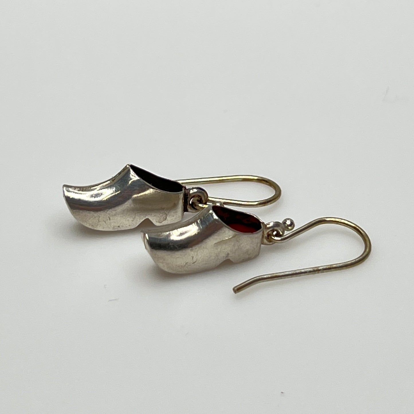 Vintage sterling silver dangle earrings shaped like Dutch clogs with red enamel