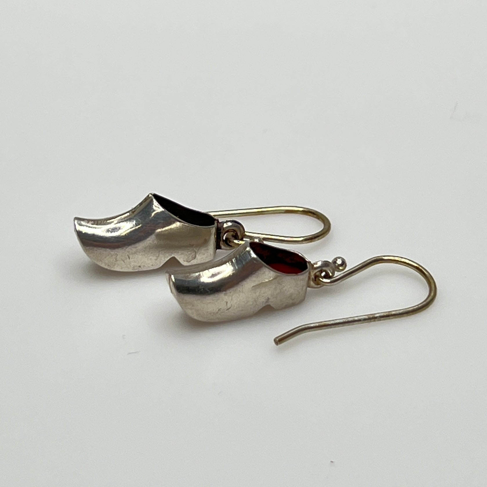 Vintage sterling silver dangle earrings shaped like Dutch clogs with red enamel