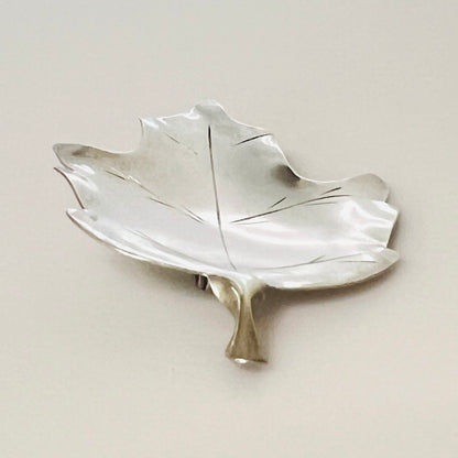 Side view of vintage Stuart Nye sterling silver maple leaf brooch and pin