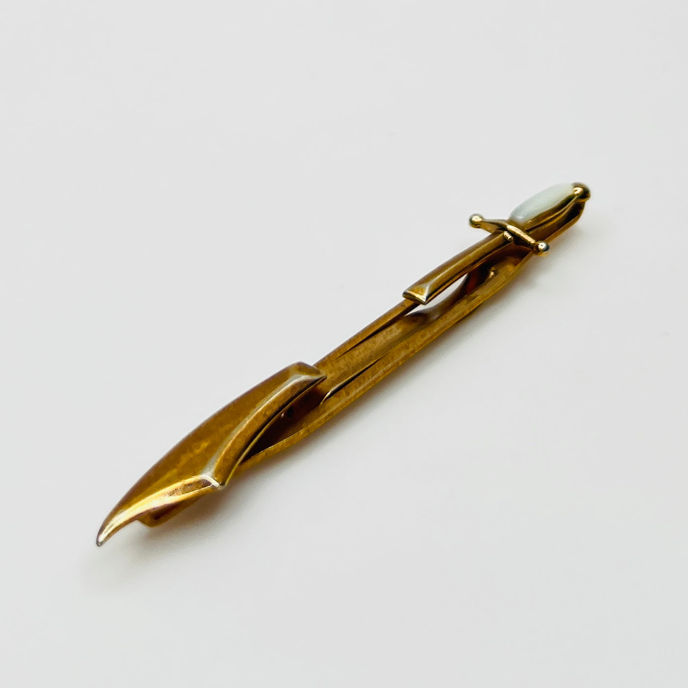 Gold tone 1950s sword tie clip signed Swank