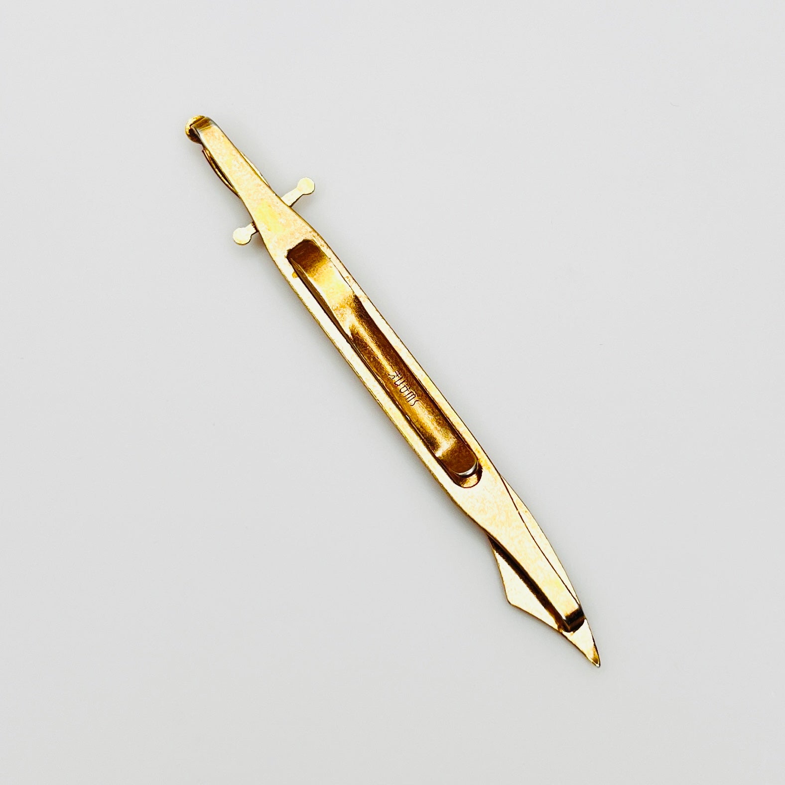 Signed Swank vintage tie bar close-up