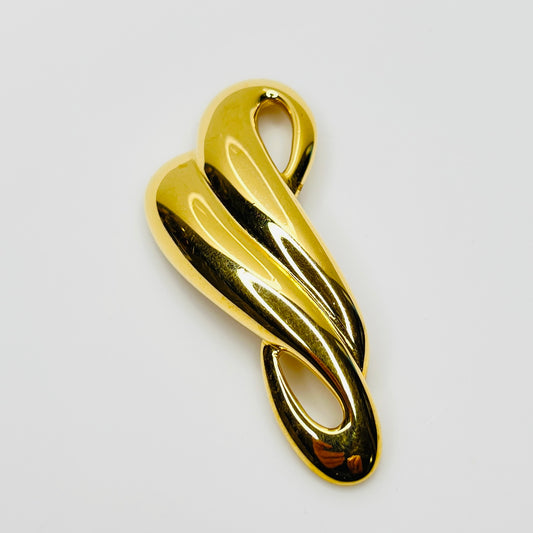 Vintage Trifari gold tone modernist ribbon brooch from the 1980s