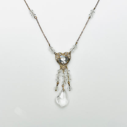 1920s crystal necklace with filigree heart centerpiece and sparkling tassel pendant