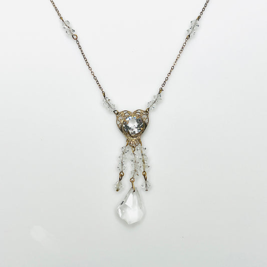 1920s crystal necklace with filigree heart centerpiece and sparkling tassel pendant