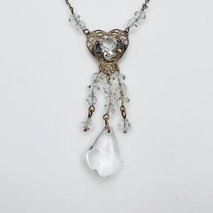 1920s crystal necklace with filigree heart centerpiece and sparkling tassel pendant