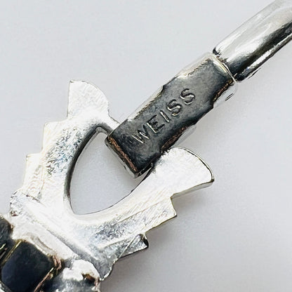 Signed Weiss clasp detail on vintage rhinestone bracelet in silver tone metal