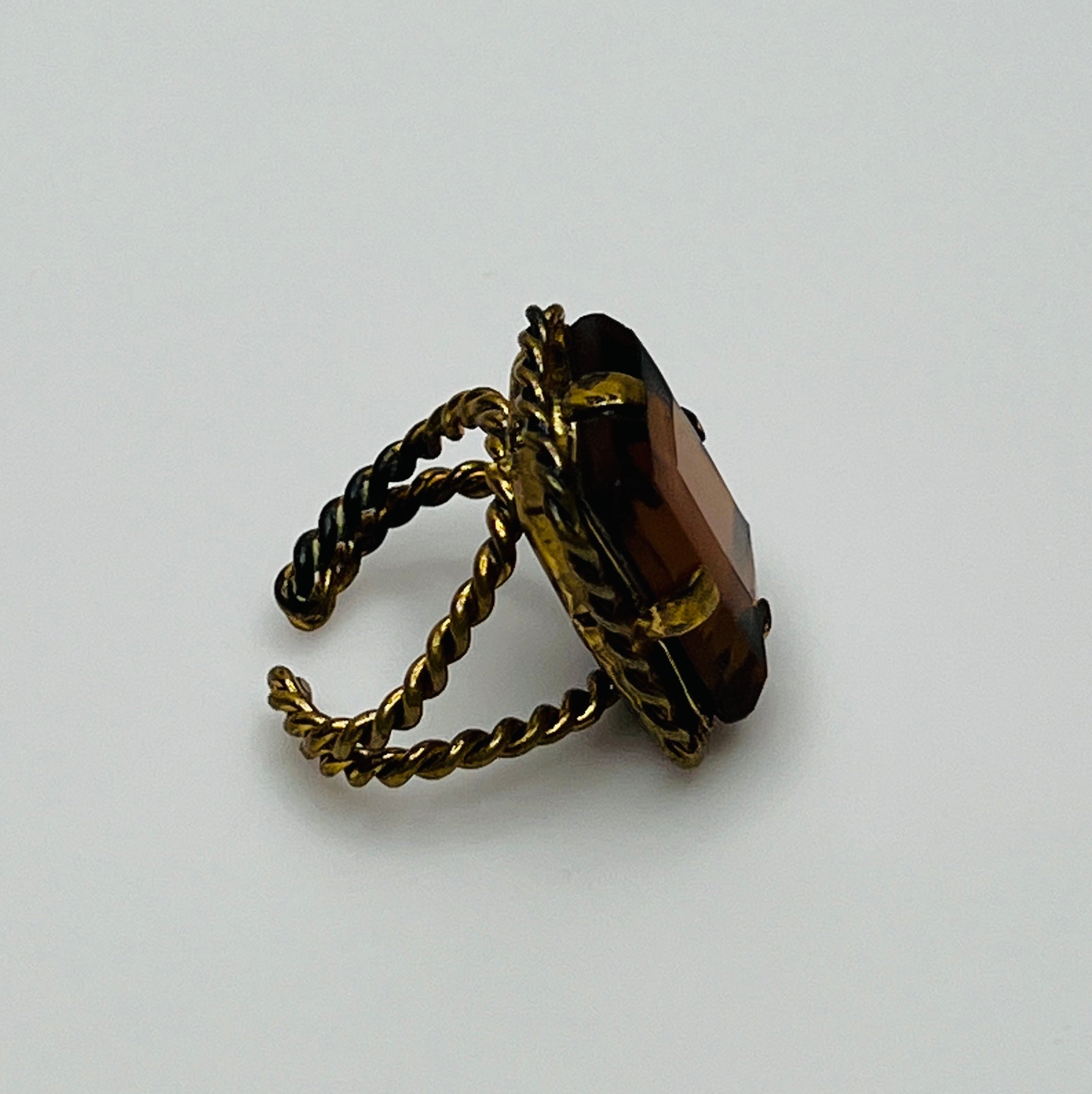 Adjustable gold-tone cocktail ring with large faceted Austrian crystal