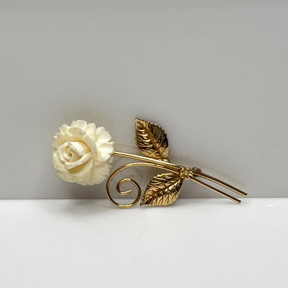 Vintage Winard 12K gold-filled brooch with carved ivory rose and long stem design