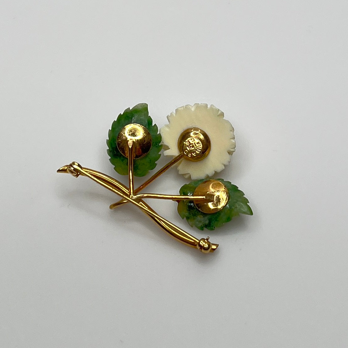 Reverse side of brooch marked “Winard”
