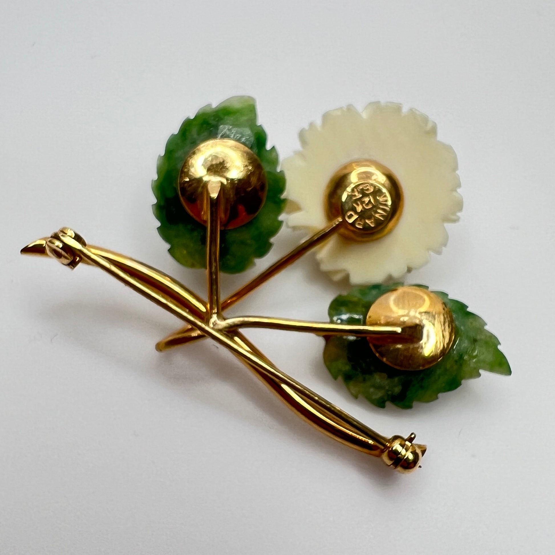 Reverse side of brooch marked “Winard”